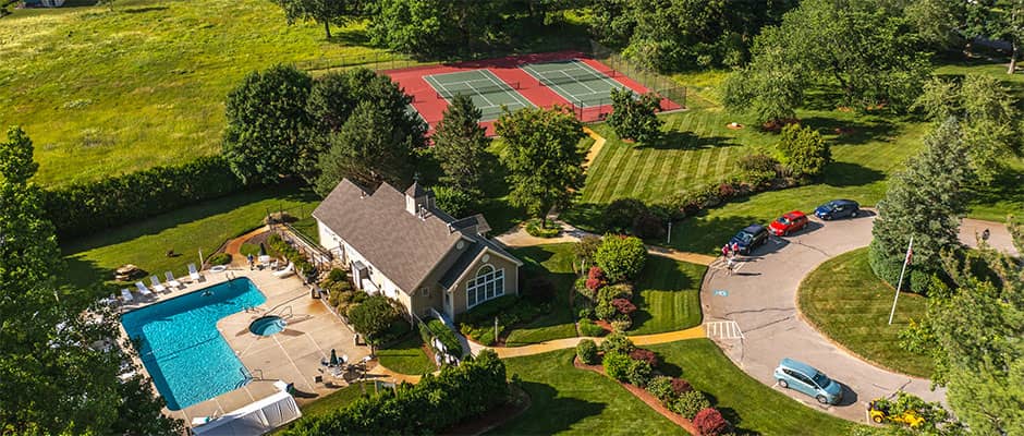 Clubhouse, pool, and tennis at Huckins Farm, Bedford, MA